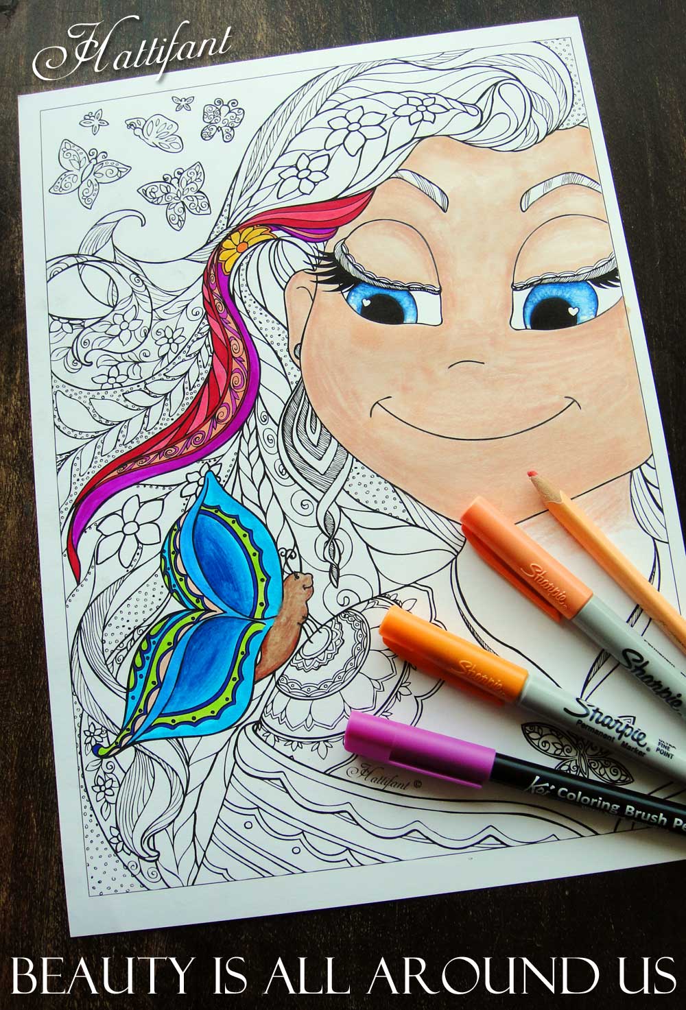 Hattifant coloring page with girl open hair and butterflies