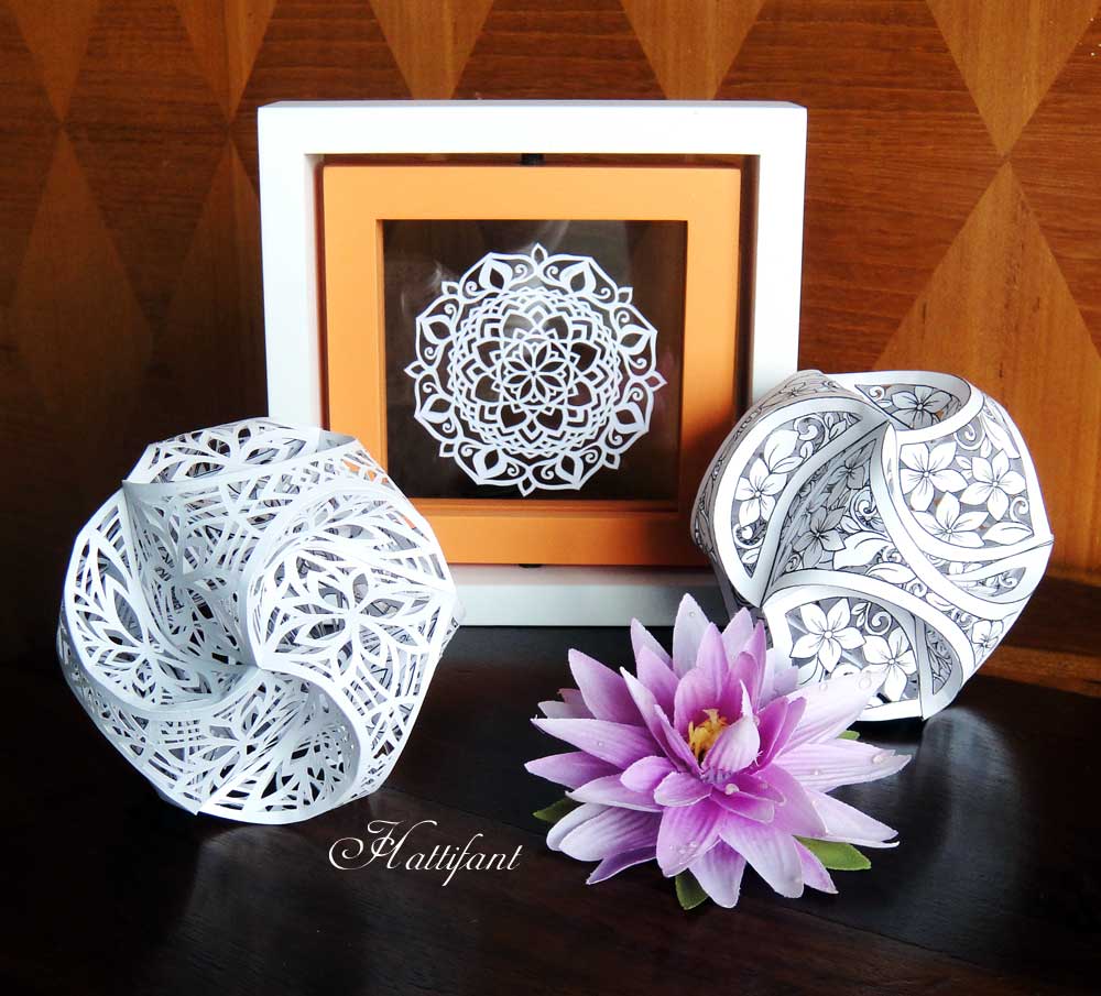 Hattifant Mandala papercut with triskele paper globe papercut