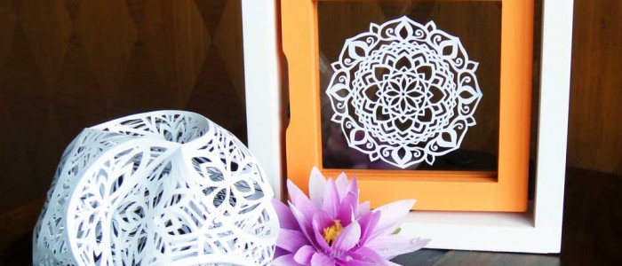 Hattifant Mandala papercut with triskele paper globe papercut