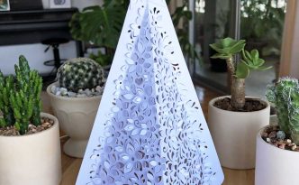 Hattifant's 3D Paper Cut Christmas Tree Luminary by daylight
