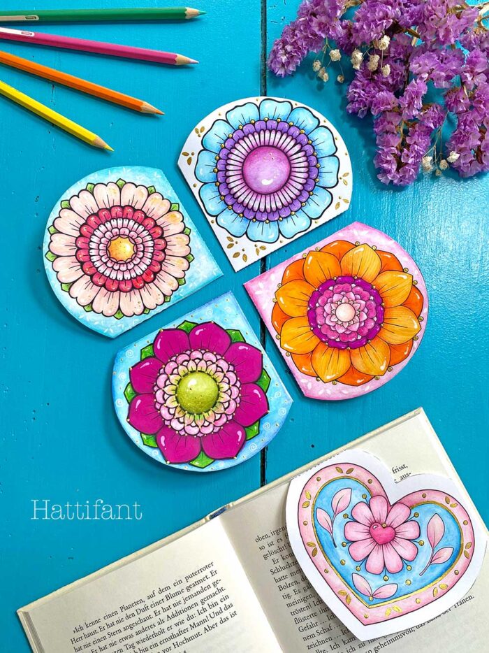 handmade and colored heart and flower corner bookmarks to help stay organized